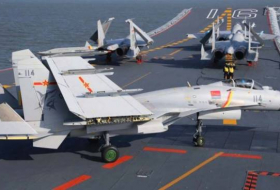 Китайские палубные истребители J-15 допустили к ночным полетам